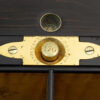 Close up of the Betjemann Patent Spring Loaded button