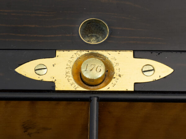 Close up of the Betjemann Patent Spring Loaded button