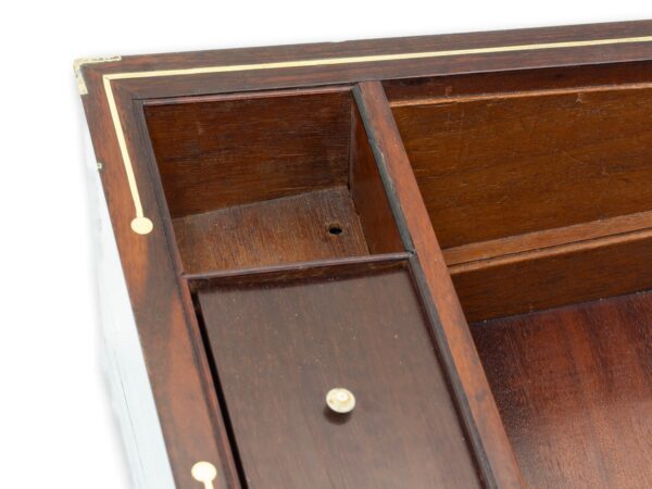 Close up of the right hand side inkwell compartment when removed showing the secret locking mechanism