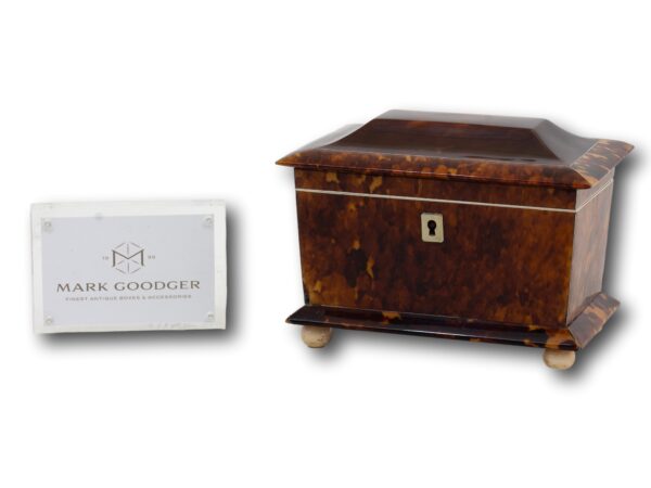 Overview of the Tortoiseshell Tea Caddy next to a business card for sizing