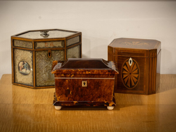 Overview of the Tortoiseshell Tea Caddy in a decorative collectors setting