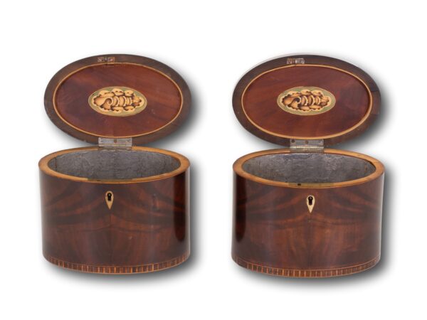Front of the Georgian Pair of Mahogany Tea Caddies with the lids up
