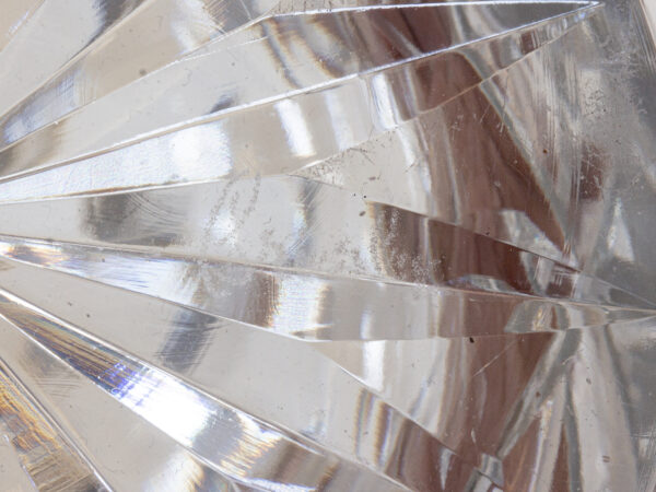 Close up of the signed glass base
