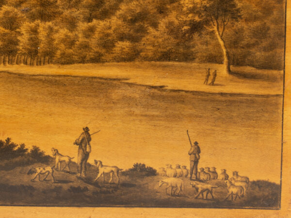 Close up of the hounds scene on the top of the box