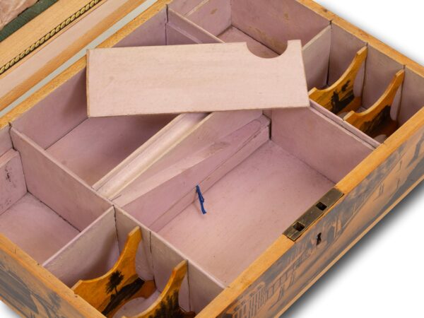 View of the secret compartment panel removed revealing the secret drawer