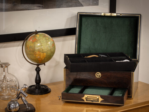 Overview of the Antique Rosewood Jewellery Box in a decorative setting