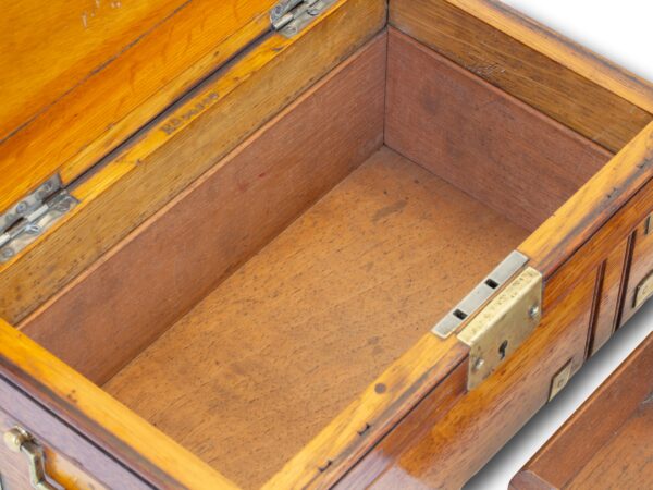View of the storage compartment below the tray