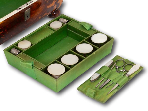 Close up of the tool tray with removable tool pad on the Tortoiseshell and Mother of Pearl Sewing Box