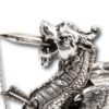 Close up of the wick and snuffer in the dragons mouth on the Overview of the Dragon Table Lighter Gifted to Earnest 'Bee' Edwards