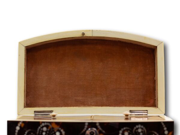 Close up of the interior of the lid form the Bow Front Tortoiseshell and Mother of Pearl Tea Caddy