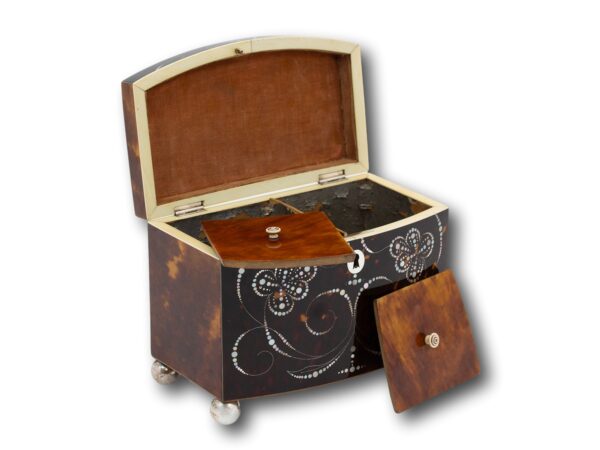 Front of the Bow Front Tortoiseshell and Mother of Pearl Tea Caddy with the lid up and compartment lids removed