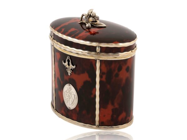 Front overview of the Silver Gilt Oval Red Tortoiseshell Tea Caddy