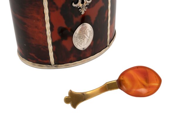 Close up of the Caddy spoon inside the Silver Gilt Oval Red Tortoiseshell Tea Caddy