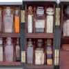 Close up of the bottles in the Mahogany Double Opening Apothecary Box