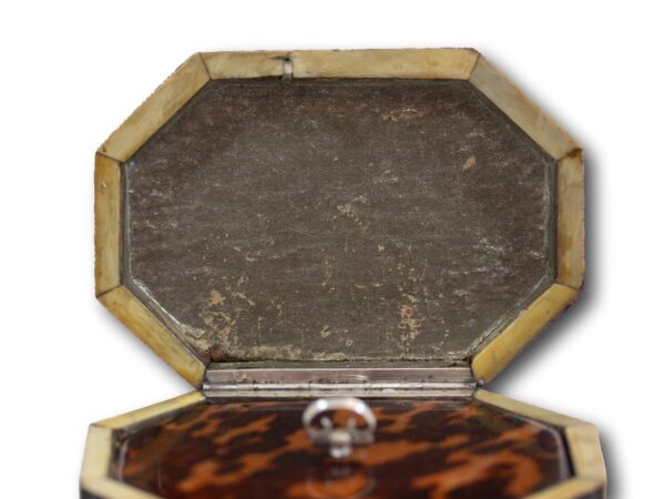Close up of the inside of the lid on the Pressed Tortoiseshell Tent Top Tea Caddy