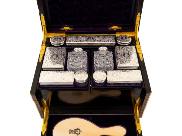 Close up of the interior of the Burr Walnut and Silver Mechanical Vanity Box Royal Connection