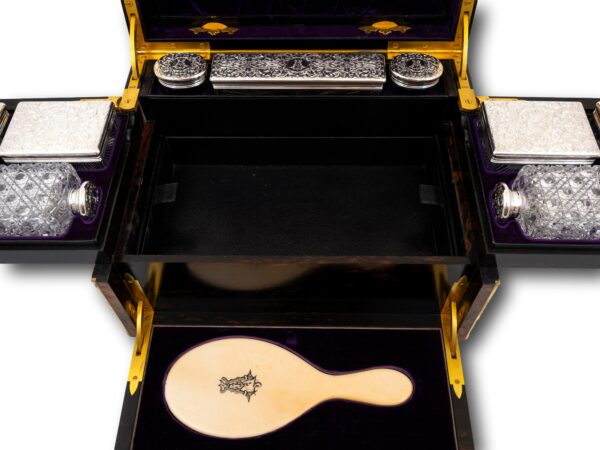 Close up of the interior trays in the Burr Walnut and Silver Mechanical Vanity Box Royal Connection