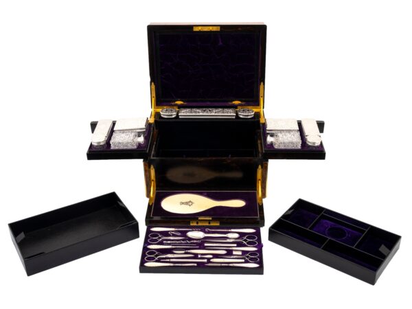 Front of the Burr Walnut and Silver Mechanical Vanity Box Royal Connection with the trays removed