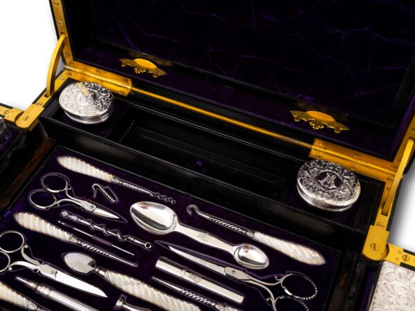 Close up of the tool tray and storage boxes in the Burr Walnut and Silver Mechanical Vanity Box Royal Connection