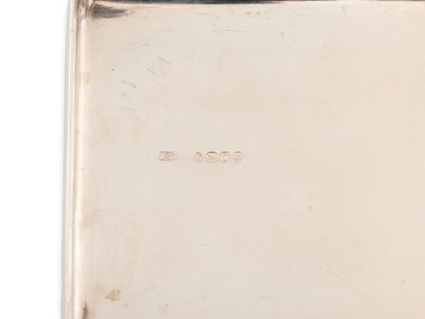 Close up of the silver hallmarks in the Burr Walnut and Silver Mechanical Vanity Box Royal Connection