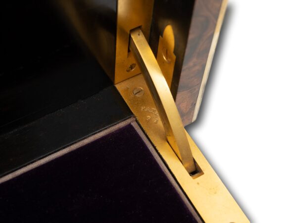 Close up of the gilt brass hinges inside the Burr Walnut and Silver Mechanical Vanity Box Royal Connection