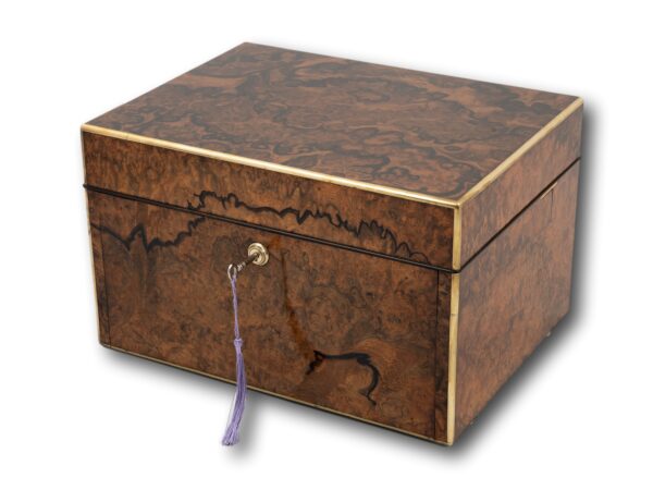 Front overview of the Burr Walnut and Silver Mechanical Vanity Box Royal Connection with the key fitted