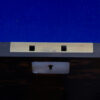 Close up of the Lund lock plate in the Coromandel Sewing Box Lund