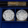 Close up of the Lund mother of pearl engraving in the Coromandel Sewing Box Lund