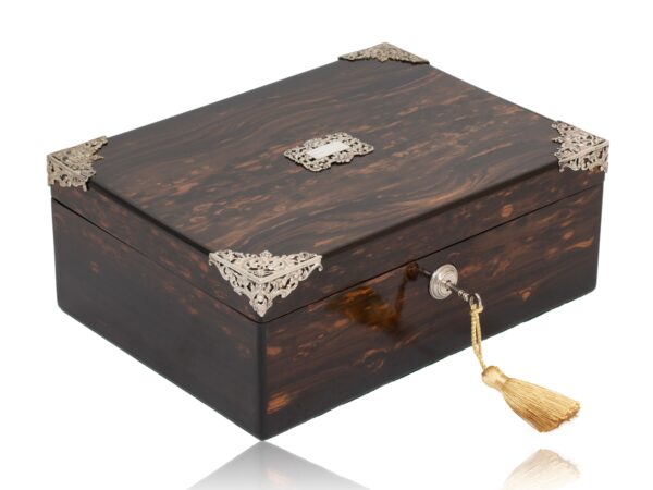 Front overview of the Coromandel Silver Mounted Cigar Box with the key fitted