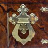 Close up of the handle on the Feathered Burr Walnut Decanter Box Betjemann Kenneth