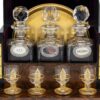 Close up of the decanter bottles and glasses inside the Feathered Burr Walnut Decanter Box Betjemann Kenneth