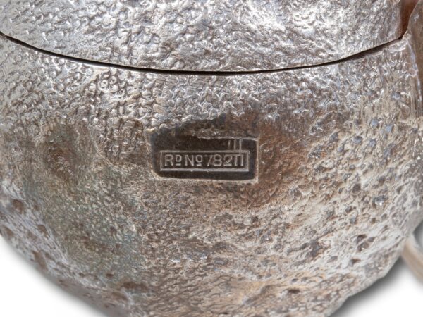 Close up of the Cocktail Fruit Squeezer Hukin & Heath registration mark