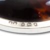 Close up of the silver hallmarks on the Silver and Tortoiseshell Candlesticks Henry Matthews