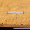 Close up of the retailers label inside the Coromandel Silver Mounted Writing Box Betjemann