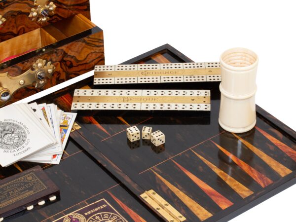 Close up of the contents of the Burr Walnut Games Compendium Betjemann
