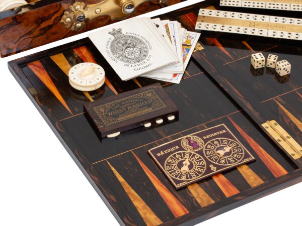 Close up of the contents of the Burr Walnut Games Compendium Betjemann