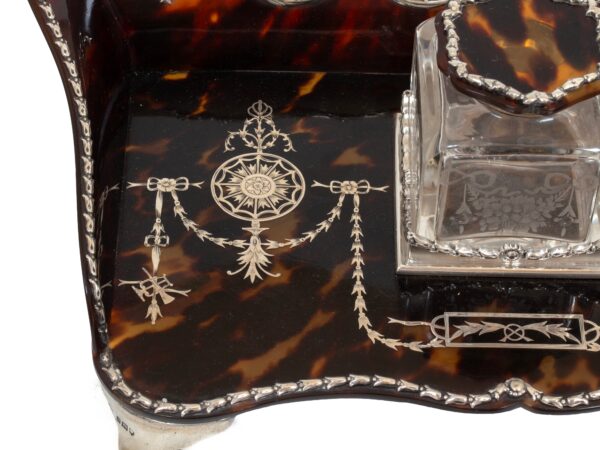 Close up of the silver pique work on the Tortoiseshell and Silver Inkwell William Comyns