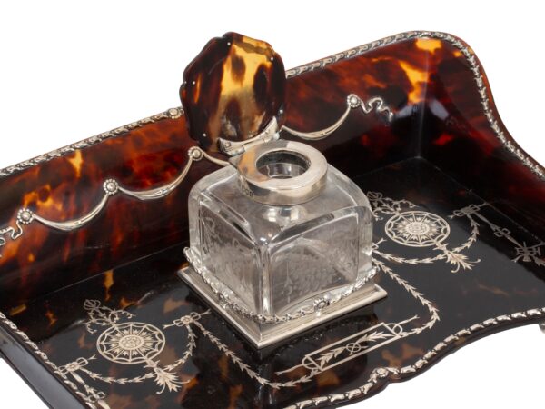 Close up of the inkwell from the Tortoiseshell and Silver Inkwell William Comyns with the lid up